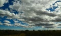 Large white clouds over a desert in the state of New Mexico, USA Royalty Free Stock Photo