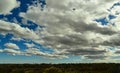Large white clouds over a desert in the state of New Mexico, USA Royalty Free Stock Photo