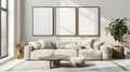 Large white couch and three blank frames for wall art mock up in living room. Modern living room. Royalty Free Stock Photo