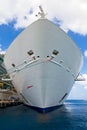 Large white cruise ship docked in the port front bow view Royalty Free Stock Photo