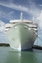 Large white cruise ship docked in the port with looking directly towards the ships bow, Caribbean Royalty Free Stock Photo