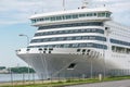 A large white cruise tourist ship moored at the pier in the passenger port Royalty Free Stock Photo