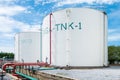 Large white industrial tanks for petrochemical or oil or fuel or water in refinery or power plant or industrail plant Royalty Free Stock Photo