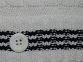 Large white knit with button Royalty Free Stock Photo