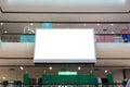 Large White LED Screen Hanging from Ceiling in modern shipping center