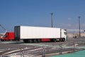 Large white lorry speeding from ferry