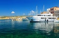 The large white luxurious yachts alongside dock at Mediterranean Sea, Chania, Crete, Greece Royalty Free Stock Photo