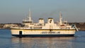 Large, white passenger ferry navigating through the blue waters of Malta. Royalty Free Stock Photo