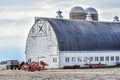 Large White Quilt Barn with Farm Equipment