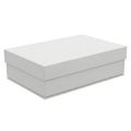 A large white rectangular box with a lid, standing on a flat surface Royalty Free Stock Photo