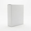 A large white rectangular box standing upright on a plain background Royalty Free Stock Photo