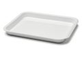 A large, white, rectangular, empty baking tray on a white background Royalty Free Stock Photo