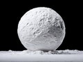 A large white sphere sitting on top of a snow covered ground Royalty Free Stock Photo