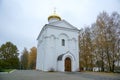 A large white stone church with a golden dome and a bell in eastern Europe is a Christian orthodox for the prayers of God Royalty Free Stock Photo