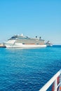 Large white tourist cruise ship on blue rippling sea Royalty Free Stock Photo