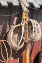 Large wicker baskets in the yard near the barn. Country life