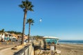 Large wide sandy beach of Avila Beach City, and city promenade