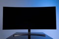 large widescreen monitor with copy-space on gray-blue background