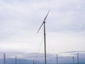 A large windmill in a wind farm