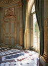 Large window, curtains and marble floor at Versailles Palace