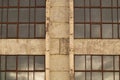 Large windows of the factory on the cement wall Royalty Free Stock Photo