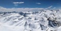 large winter panorama on the fanellhorn in canton of grisons. Lots of snowy mountain peaks. Ski tour in the valley vals