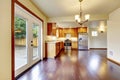 Large wood kitchen room with cherry hardwood floor.