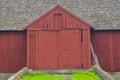 Close up of a big red barn with large double doors in Chaddsforge Pa.