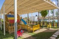 Large wooden climbing frame in children`s playground area Royalty Free Stock Photo