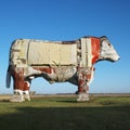 Large wooden cow sculpture. Royalty Free Stock Photo