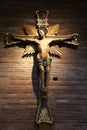 The large wooden crucifix on the southern wall. The Abbey of Nonantola. Modena, Italy