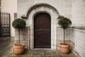 A large wooden door closed an old fortress in the stone wall of the castle in Germany on the Rhine River Royalty Free Stock Photo