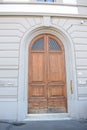 Large wooden door in a historic building in Florence