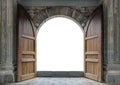 Large wooden door open in castle wall