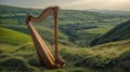 A large wooden harp is positioned on top of a vibrant hillside covered in luscious green grass