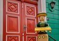 Large wooden toy doll in traditional design in front of the toy museum in Soltau Germany