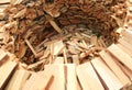 Woodshed circular shape with many pieces of wood cut to warm up