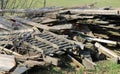Large woodshed with many pieces of wood and other wooden materia