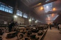 Large workshop interior for metalworking of finished cast metal products at metallurgical plant of heavy industry