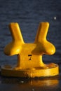 A Large Yellow Mooring Bollard