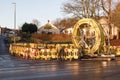 Large yellow piping on a spool with safety barriers for gas works