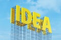 Large yellow signboard on metal frame with the word idea