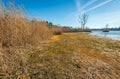 Largely dry lake at the end of the winter season