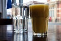 Larges glases of Orange Juice Friut and Clear Lemonade cold drinks on a dark wooden table. Royalty Free Stock Photo