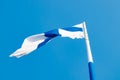 The largest finnish flag in the world and the tallest flagpole in Europe against blue sky, Hamina, Finland. The flag pole is 100 Royalty Free Stock Photo