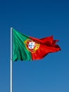 Flag of Portugal waving in the wind Royalty Free Stock Photo