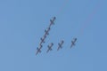 Largest Military Show at Marjan Island with coordinated military aircrafts on the bright blue sky