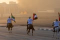 Largest Military Show at Marjan Island with coordinated military event with horses riding down the street and UAE flags landing in