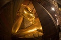 The largest and beautiful golden Reclining Buddha in Wat Pho , Bangkok.