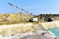 Largest Walking Dragline Excavator in the chalk quarry. Big Muskie in open pit mining. Mining Dragline. Heavy mining industry and Royalty Free Stock Photo